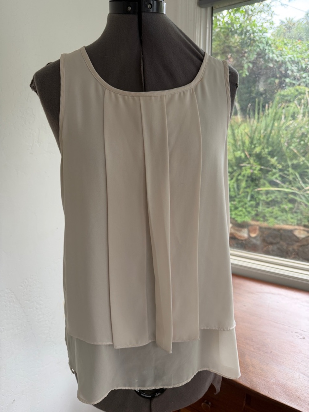HD in Paris lightweight cream pleated top with short sleeves from Anthropology.